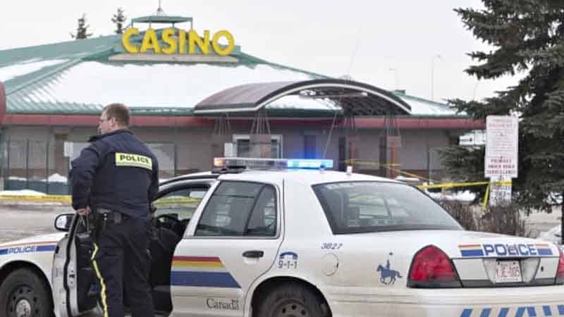 a police officer arriving in a casino parking lot
